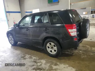 2009 Suzuki Grand Vitara with VIN JS3TE042694100010, listed as a Copart auction lot 56716225 with 148,495 mi miles and Salvage title. Bid and sale history available at DreamBid. Image 2.