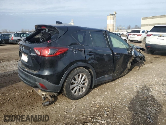 2015 Mazda CX-5 Touring with VIN JM3KE4CY4F0434425, listed as a Copart auction lot 48111255 with Not Provided miles and Salvage Title. Bid and sale history available at DreamBid. Image 3.