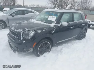 2016 MINI Cooper Countryman S with VIN WMWZC3C56GWT11105, listed as a IAAI auction lot 41228246 with 102,971 mi miles. Bid and sale history available at carsss.com. Image 17.
