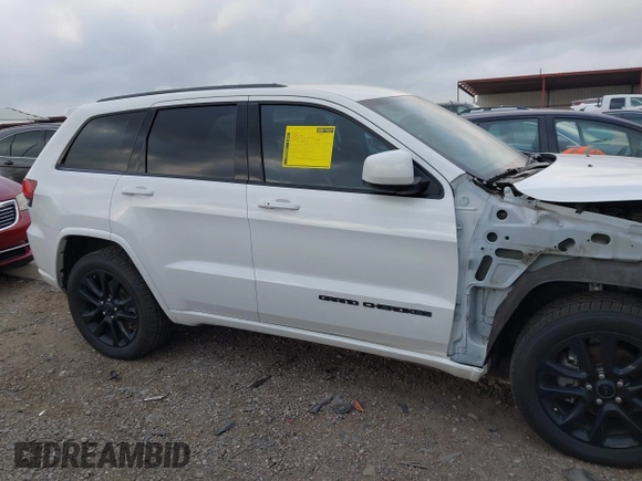 2017 Jeep Grand Cherokee Altitude z VIN 1C4RJFAG3HC707171, wystawiony jako IAAI lot #42145431 z przebiegiem 82 199 mil mil oraz . Historia ofert i sprzedaży dostępna na DreamBid. Obrazek 14.