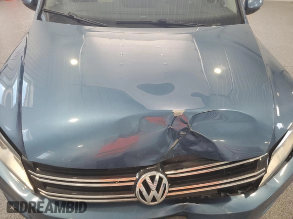 2017 Volkswagen Tiguan Wolfsburg Edition with VIN WVGSV7AX8HK014738, listed as a Copart auction lot 62255775 with 123,768 mi miles and Salvage title. Bid and sale history available at DreamBid. Image 12.