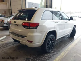 2019 Jeep Grand Cherokee Laredo E with VIN 1C4RJFAG1KC818289, listed as a IAAI auction lot 41602541 with 59,356 mi miles. Bid and sale history available at carsss.com. Image 4.