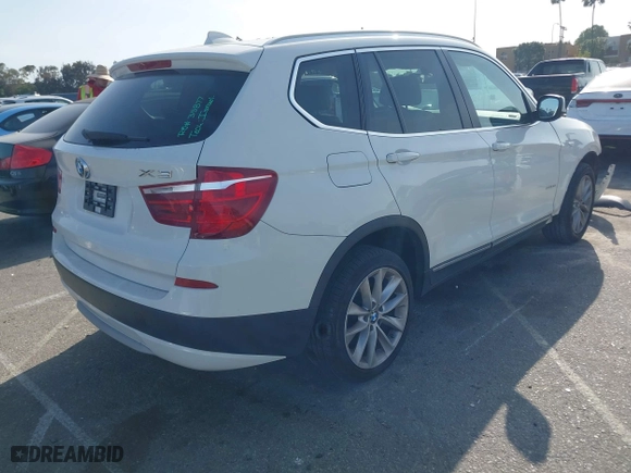 2011 BMW X3 28i with VIN 5UXWX5C52BL715405, listed as a IAAI auction lot 41915177 with 142,199 mi miles. Bid and sale history available at carsss.com. Image 4.