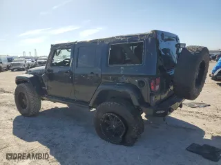 2015 Jeep Wrangler Unlimited Rubicon Hard Rock with VIN 1C4HJWFG1FL710264, listed as a Copart auction lot 47563975 with 96,737 mi miles and Salvage Title. Bid and sale history available at carsss.com. Image 2.