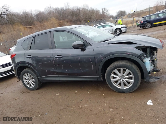 2016 Mazda CX-5 Touring with VIN JM3KE4CY7G0715507, listed as a IAAI auction lot 41699610 with 108,206 mi miles. Bid and sale history available at carsss.com. Image 14.
