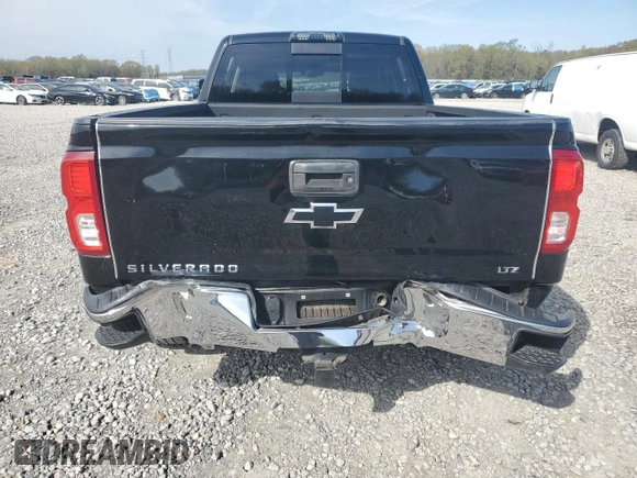 2017 Chevrolet Silverado 1500 LTZ with VIN 3GCUKSEJ9HG491930, listed as a Copart auction lot 51223025 with 128,251 mi miles and Salvage Title. Bid and sale history available at DreamBid. Image 6.