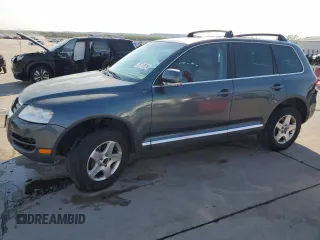 2005 Volkswagen Touareg 4.2L V8 with VIN WVGZM77L55D061960, listed as a Copart auction lot 75717614 with 188,101 mi miles and Salvage Title. Bid and sale history available at DreamBid. Image 1.