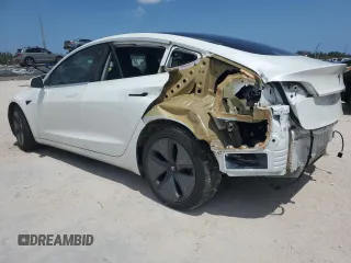 2019 Tesla Model 3 Long Range with VIN 5YJ3E1EB5KF418329, listed as a Copart auction lot 52183935 with 121,784 mi miles and Salvage Title. Bid and sale history available at DreamBid. Image 2.