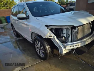 2020 Honda Pilot EX with VIN 5FNYF5H35LB018190, listed as a IAAI auction lot 42742588 with 30,232 mi miles and . Bid and sale history available at DreamBid. Image 1.