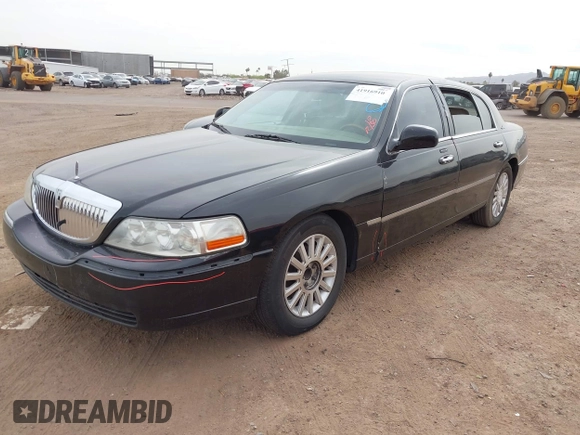 2008 Lincoln Town Car z VIN 2LNHM85WX8X636193, wystawiony jako IAAI lot #41916910 z przebiegiem Nie podano mil oraz . Historia ofert i sprzedaży dostępna na DreamBid. Obrazek 16.
