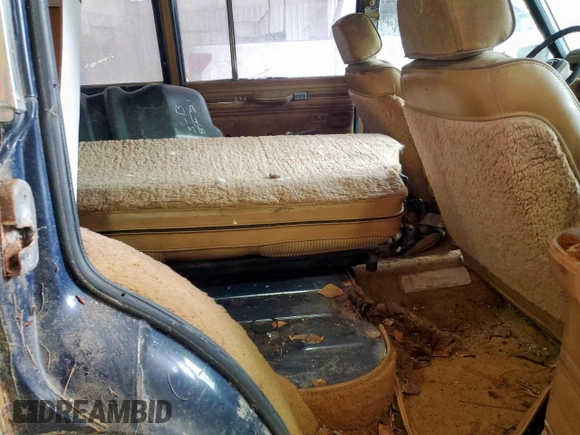 1986 Jeep Grand Wagoneer с VIN 1JCNJ15U5GT147524, выставлен на аукционе Copart как лот 57421255 с пробегом 112 292 миль миль и Списание • Salvage title. История ставок и продаж доступна на DreamBid. Изображение 10.