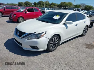 2016 Nissan Altima SV with VIN 1N4AL3AP9GC135114, listed as a IAAI auction lot 41851507 with 127,033 mi miles and . Bid and sale history available at DreamBid. Image 2.