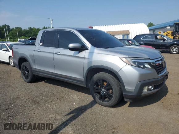 2018 Honda Ridgeline RTL-E with VIN 5FPYK3F77JB014975, listed as a Copart auction lot 59798125 with 124,361 mi miles and Clean title. Bid and sale history available at DreamBid. Image 4.