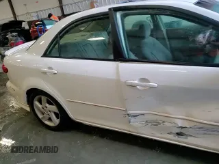 2004 Mazda 6 i with VIN 1YVFP80CX45N43521, listed as a Copart auction lot 73315234 with 182,697 mi miles and Salvage Title. Bid and sale history available at DreamBid. Image 11.