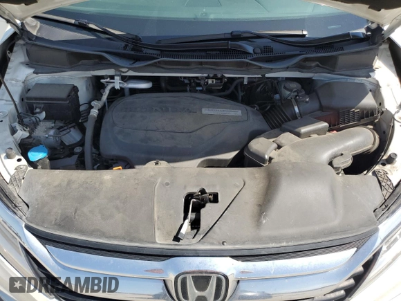 2019 Honda Odyssey Touring with VIN 5FNRL6H86KB089055, listed as a Copart auction lot 56980975 with 154,842 mi miles and Salvage title. Bid and sale history available at DreamBid. Image 12.