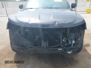 2018 Jeep Grand Cherokee Laredo E with VIN 1C4RJFAG7JC294905, listed as a IAAI auction lot 42452977 with 75,916 mi miles and . Bid and sale history available at DreamBid. Image 6.