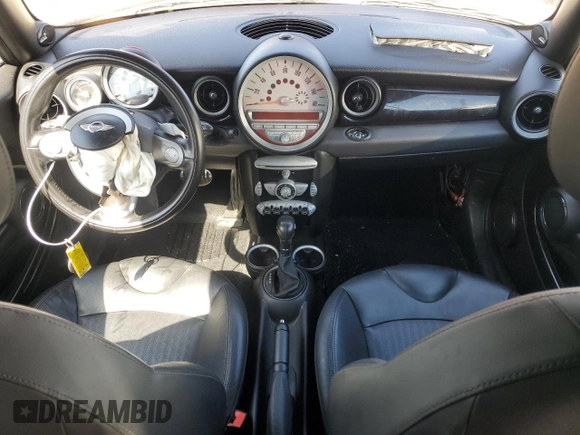 2010 MINI Convertible S with VIN WMWMS3C51ATZ85166, listed as a Copart auction lot 52907775 with 90,090 mi miles and Salvage title. Bid and sale history available at DreamBid. Image 8.