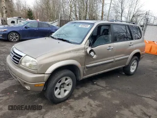 2002 Suzuki XL7 Standard z VIN JS3TX92V824131454, wystawiony jako Copart lot #45289455 z przebiegiem 244 098 mil mil oraz Szkoda całkowita • Salvage title. Historia ofert i sprzedaży dostępna na DreamBid. Obrazek 1.