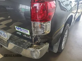 2013 Toyota Tundra 4WD Truck with VIN 5TFUW5F17DX272636, listed as a IAAI auction lot 42143265 with 297,828 mi miles. Bid and sale history available at carsss.com. Image 1.