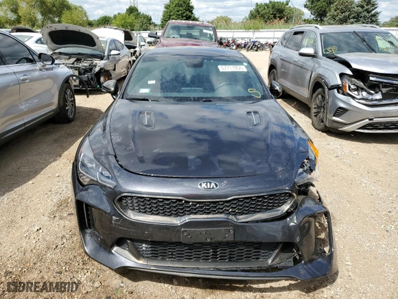 2021 Kia Stinger GT with VIN KNAE35LC2M6089778, listed as a Copart auction lot 67711054 with 76,690 mi miles and Salvage Title. Bid and sale history available at carsss.com. Image 5.