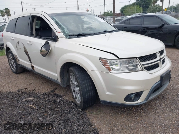 2013 Dodge Journey R/T with VIN 3C4PDCEG5DT642751, listed as a IAAI auction lot 42306951 with 129,338 mi miles and . Bid and sale history available at DreamBid. Image 1.