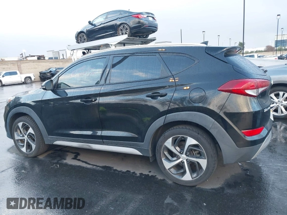 2018 Hyundai Tucson Sport with VIN KM8J33AL4JU753431, listed as a IAAI auction lot 41685678 with 71,934 mi miles. Bid and sale history available at carsss.com. Image 14.