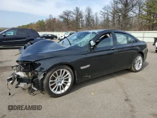 2015 BMW 7 Series 750i xDrive with VIN WBAYB6C59FD965994, listed as a Copart auction lot 53994545 with 119,929 mi miles and Salvage Title. Bid and sale history available at carsss.com. Image 1.