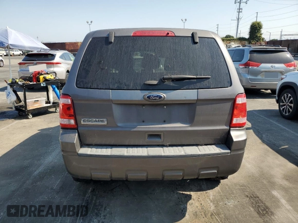 2011 Ford Escape XLS with VIN 1FMCU0C79BKC12943, listed as a Copart auction lot 64702085 with 151,117 mi miles and Clean title. Bid and sale history available at DreamBid. Image 6.