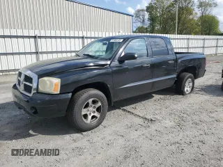 2006 Dodge Dakota SLT with VIN 1D7HE48NX6S523704, listed as a Copart auction lot 51960105 with 186,302 mi miles and Salvage title. Bid and sale history available at DreamBid. Image 1.