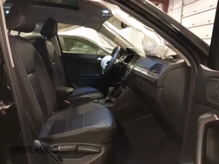 2021 Volkswagen Tiguan SE with VIN 3VV2B7AXXMM034880, listed as a IAAI auction lot 41979636 with 34,490 mi miles and . Bid and sale history available at DreamBid. Image 5.