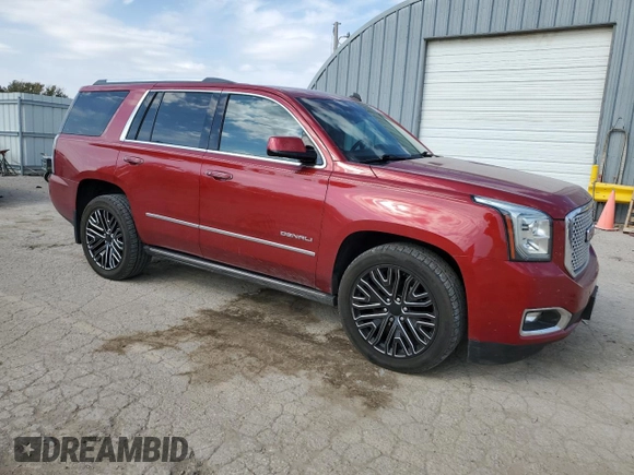 2015 GMC Yukon Denali with VIN 1GKS2CKJ6FR136152, listed as a Copart auction lot 76967664 with 137,208 mi miles and Salvage Title. Bid and sale history available at carsss.com. Image 4.