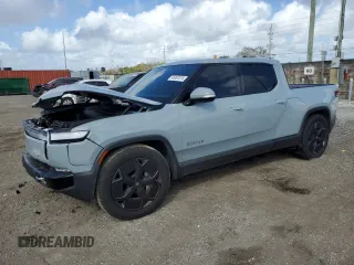 2023 Rivian R1T Adventure with VIN 7FCTGBAA2PN028983, listed as a Copart auction lot 45307015 with 220 mi miles and Salvage Title. Bid and sale history available at carsss.com. Image 1.