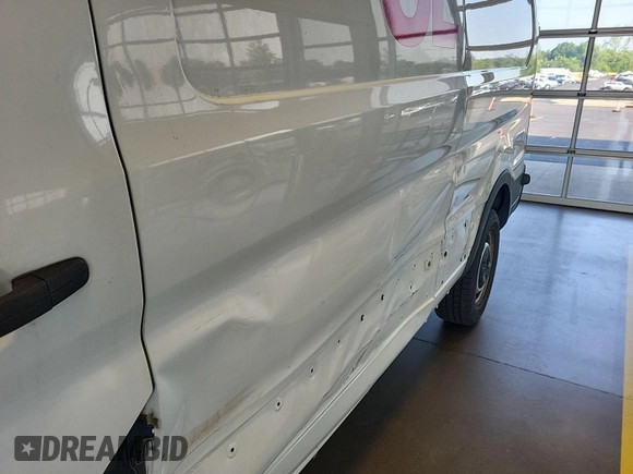 2015 Ford Transit with VIN 1FTNE2YM1FKA20300, listed as a IAAI auction lot 42634833 with 53,803 mi miles and . Bid and sale history available at DreamBid. Image 23.