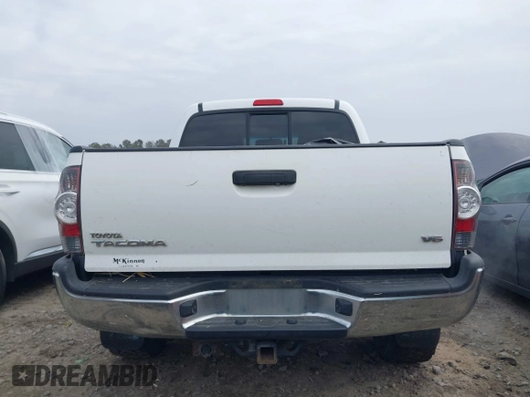 2013 Toyota Tacoma z VIN 5TFLU4EN2DX076815, wystawiony jako IAAI lot #41344839 z przebiegiem 311 083 mil mil oraz . Historia ofert i sprzedaży dostępna na DreamBid. Obrazek 16.