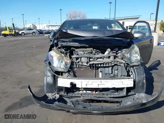2012 Scion iQ with VIN JTNJJXB07CJ017296, listed as a IAAI auction lot 41636769 with 94,333 mi miles. Bid and sale history available at carsss.com. Image 6.