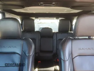 2018 Jeep Wrangler Unlimited Sahara z VIN 1C4HJXENXJW262779, wystawiony jako Copart lot #47882345 z przebiegiem Nie podano mil oraz Szkoda całkowita • Salvage title. Historia ofert i sprzedaży dostępna na DreamBid. Obrazek 10.