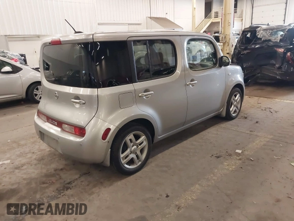 2009 Nissan Cube 1.8 SL with VIN JN8AZ28RX9T121918, listed as a IAAI auction lot 41517261 with 104,332 mi miles. Bid and sale history available at carsss.com. Image 4.