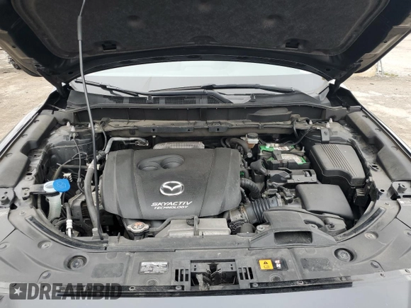 2017 Mazda CX-5 Grand Touring with VIN JM3KFBDL7H0204658, listed as a Copart auction lot 54007165 with 154,546 mi miles and Salvage Title. Bid and sale history available at carsss.com. Image 12.