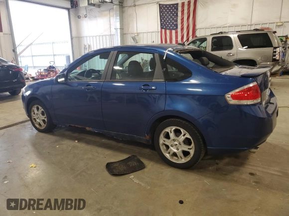 2009 Ford Focus SES with VIN 1FAHP36N79W219797, listed as a Copart auction lot 54210005 with 122,340 mi miles and Non Repairable. Bid and sale history available at carsss.com. Image 2.