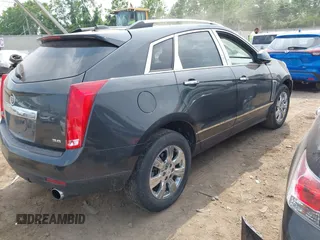 2016 Cadillac SRX Luxury Collection with VIN 3GYFNBE33GS553426, listed as a IAAI auction lot 42416200 with 118,256 mi miles and . Bid and sale history available at DreamBid. Image 4.