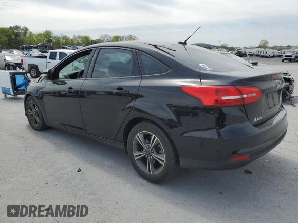 2017 Ford Focus SE with VIN 1FADP3FEXHL281886, listed as a Copart auction lot 53457455 with 84,228 mi miles and Salvage Title. Bid and sale history available at carsss.com. Image 2.