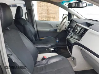 2012 Toyota Sienna SE with VIN 5TDXK3DC2CS235211, listed as a IAAI auction lot 42390354 with 242,602 mi miles and . Bid and sale history available at DreamBid. Image 5.