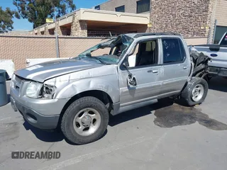 2005 Ford Explorer Sport Trac XLS z VIN 1FMDU67K25UA01209, wystawiony jako IAAI lot #39448448 z przebiegiem Nie podano mil oraz . Historia ofert i sprzedaży dostępna na DreamBid. Obrazek 2.