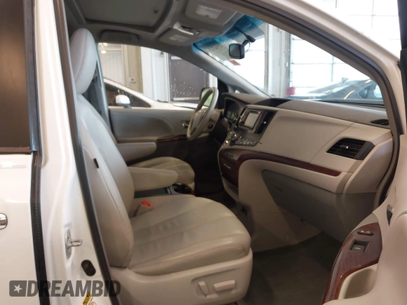 2014 Toyota Sienna XLE with VIN 5TDYK3DC5ES508021, listed as a IAAI auction lot 41963128 with 162,578 mi miles. Bid and sale history available at carsss.com. Image 5.