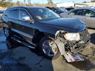 2013 Jeep Grand Cherokee Overland with VIN 1C4RJFCTXDC525097, listed as a Copart auction lot 42250875 with 214,368 mi miles and Salvage Title. Bid and sale history available at carsss.com. Image 4.