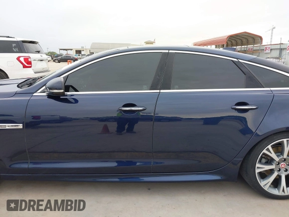 2018 Jaguar XJ R-Sport with VIN SAJWA1C74J8W14026, listed as a IAAI auction lot 42032719 with 95,263 mi miles and . Bid and sale history available at DreamBid. Image 14.