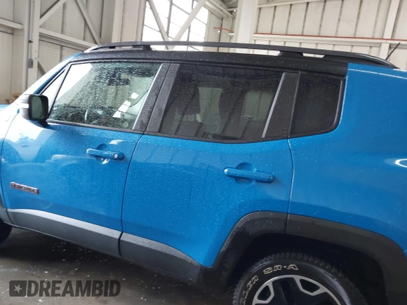 2015 Jeep Renegade Trailhawk with VIN ZACCJBCT0FPB59264, listed as a IAAI auction lot 42203406 with 109,000 mi miles and . Bid and sale history available at DreamBid. Image 14.