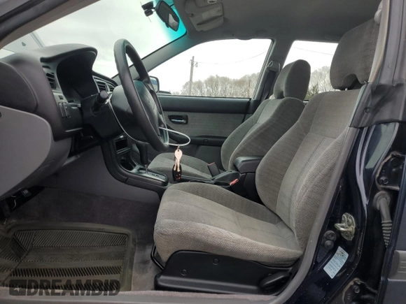 2002 Subaru Legacy L with VIN 4S3BH635327304235, listed as a Copart auction lot 53346715 with 194,334 mi miles and Salvage title. Bid and sale history available at DreamBid. Image 7.