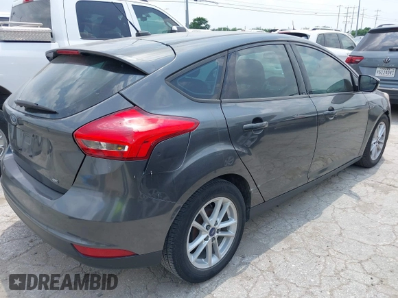 2017 Ford Focus SE with VIN 1FADP3K24HL318684, listed as a IAAI auction lot 42161586 with 196,681 mi miles and . Bid and sale history available at carsss.com. Image 4.