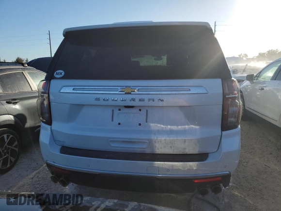 2022 Chevrolet Suburban High Country with VIN 1GNSKGKL3NR233657, listed as a Copart auction lot 74177244 with 9,111 mi miles and Salvage Title. Bid and sale history available at DreamBid. Image 6.